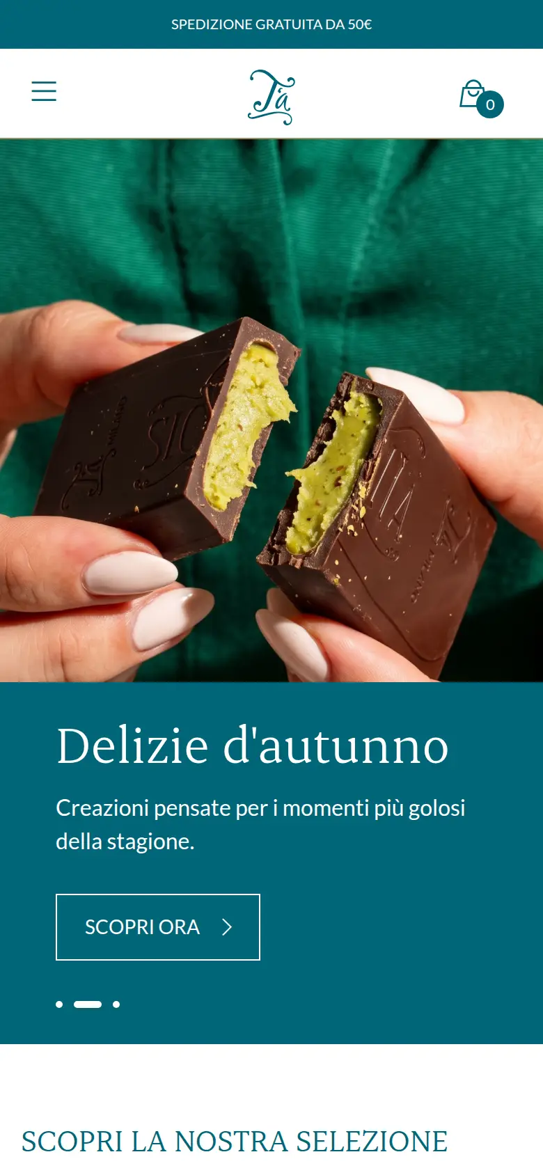 La home di shop.tamilano.com oggi, dal telefono, chiuso il banner dei cookie: lo slider con due mani che spezzano un cioccolatino al pistacchio e «Delizie d'autunno»